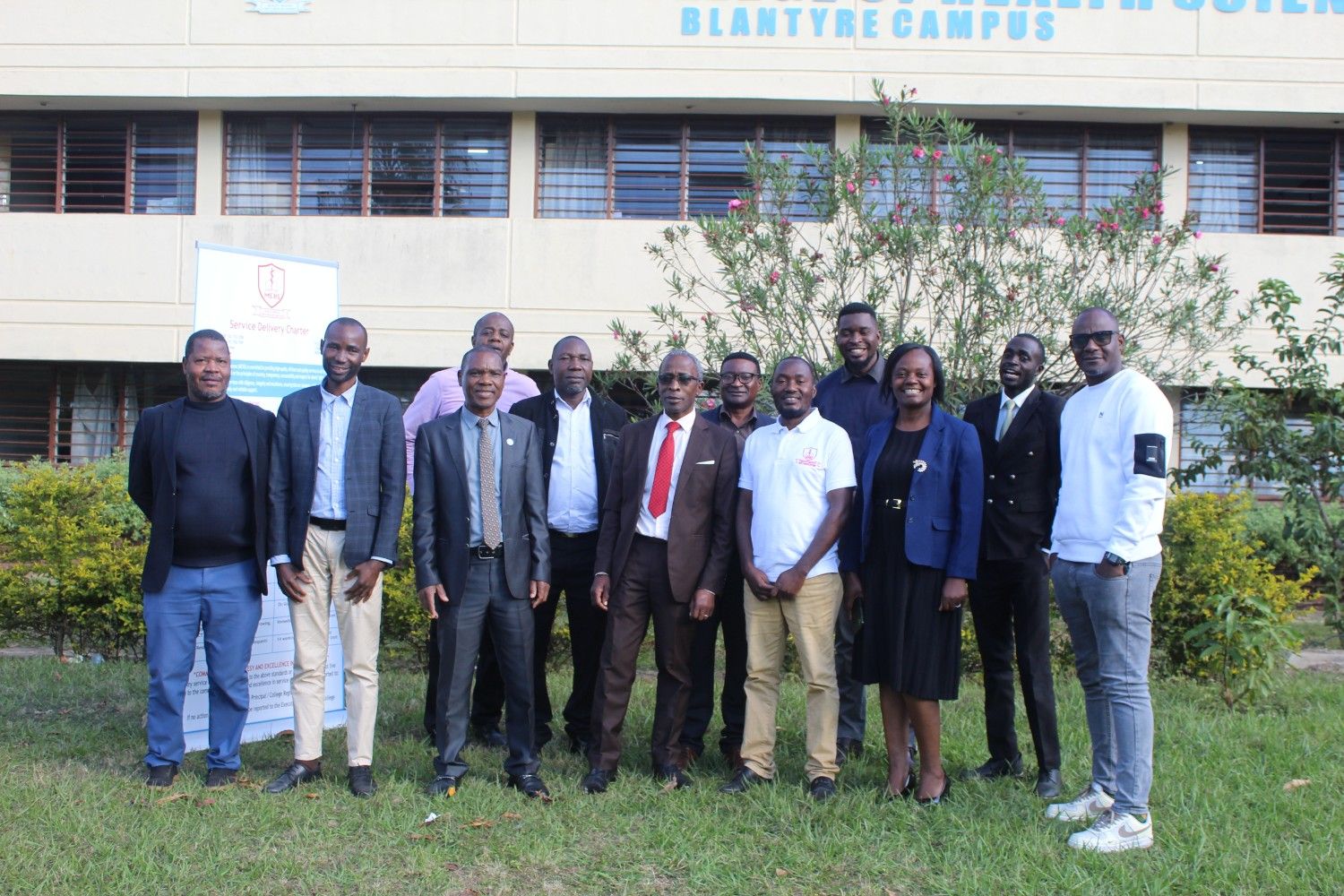 A group photo after a fruitful meeting with the Medical Council of Malawi.